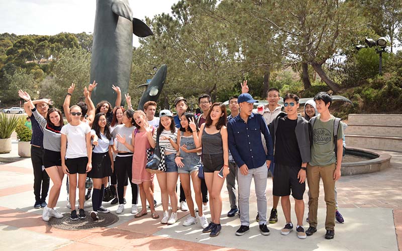 future leaders summer program students posing during a field trip to nearby san diego museum