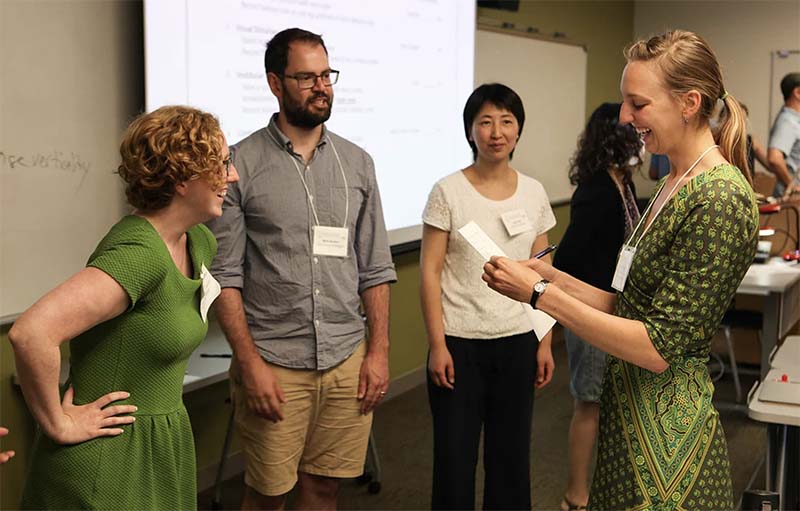 Group of teachers working with a student teacher at  the Summer Institutes on Scientific Teaching